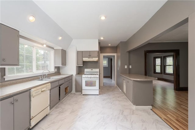 135 Gardiner Ave, Rochester, NY 14611 - kitchen featuring white appliances, under cabinet range hood, gray cabinets, a sink, and recessed lighting