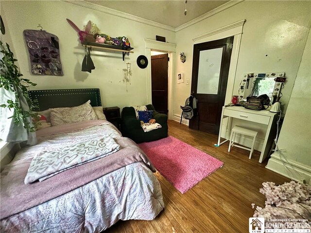 223 S 7th St, Olean-City, NY 14760 - bedroom featuring crown molding, wood finished floors, and baseboards