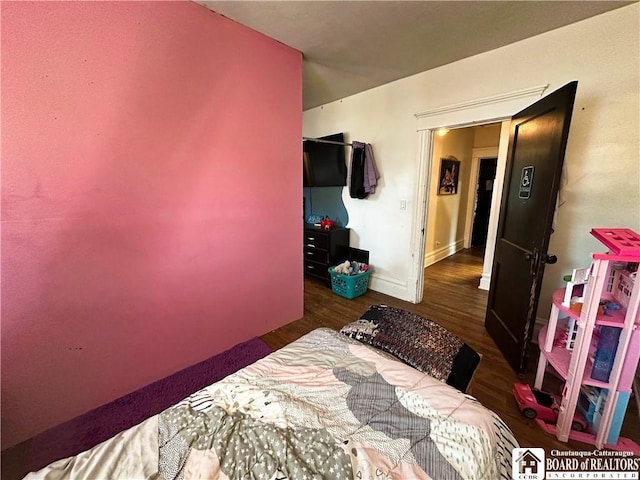 223 S 7th St, Olean-City, NY 14760 - bedroom with wood finished floors and baseboards