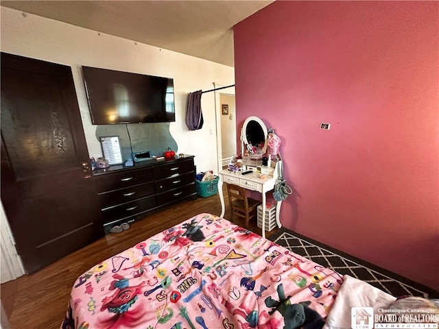 223 S 7th St, Olean-City, NY 14760 - bedroom with dark wood-style flooring