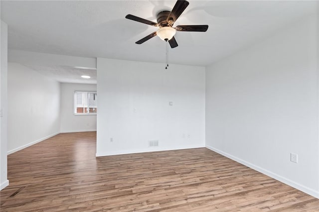 275 Owens Rd Unit 115, Sweden, NY 14420 - unfurnished room with wood finished floors, baseboards, a ceiling fan, and recessed lighting