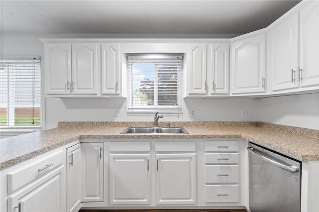 275 Owens Rd Unit 115, Sweden, NY 14420 - kitchen featuring dishwasher, a sink, white cabinets, and light countertops