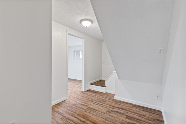 275 Owens Rd Unit 115, Sweden, NY 14420 - empty room with wood finished floors and baseboards