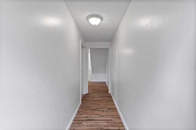 275 Owens Rd Unit 115, Sweden, NY 14420 - corridor with wood finished floors and baseboards