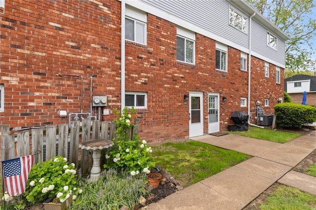 275 Owens Rd Unit 115, Sweden, NY 14420 - view of side of home with brick siding