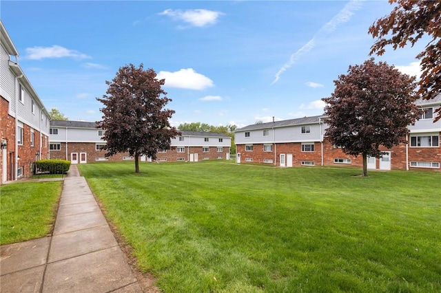 275 Owens Rd Unit 115, Sweden, NY 14420 - view of grassy yard with a residential view
