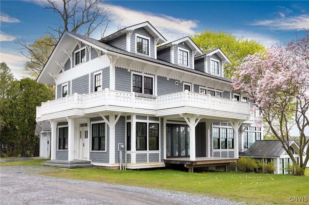3 W Lake St, Skaneateles, NY 13152 - view of front of property with a balcony and a front yard