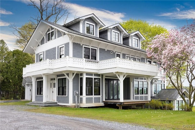 3 W Lake St, Skaneateles, NY 13152 - view of front of property with a balcony and a front yard