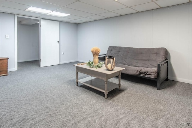 1039 Holcomb St, Watertown-City, NY 13601 - carpeted living room with a paneled ceiling and baseboards