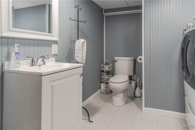 1039 Holcomb St, Watertown-City, NY 13601 - bathroom featuring toilet, baseboards, vanity, and tile patterned flooring