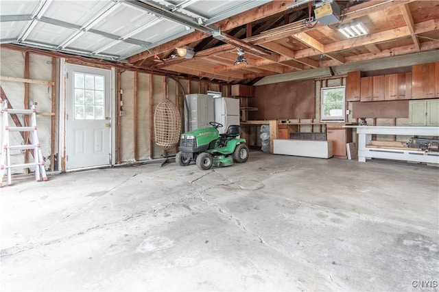 1039 Holcomb St, Watertown-City, NY 13601 - garage featuring freestanding refrigerator