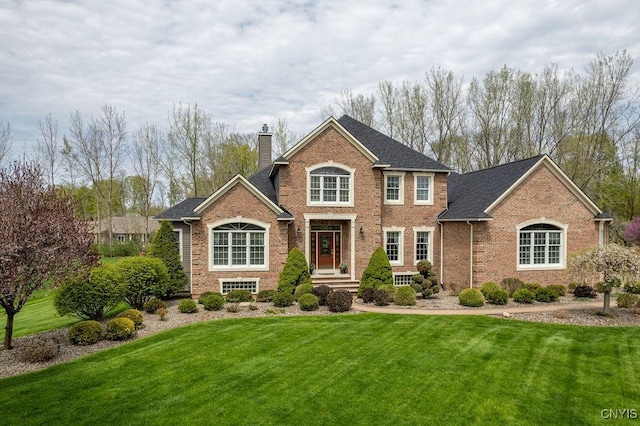 1968 Penfold Way, Lysander, NY 13027 - view of front of property featuring brick siding, a chimney, and a front yard