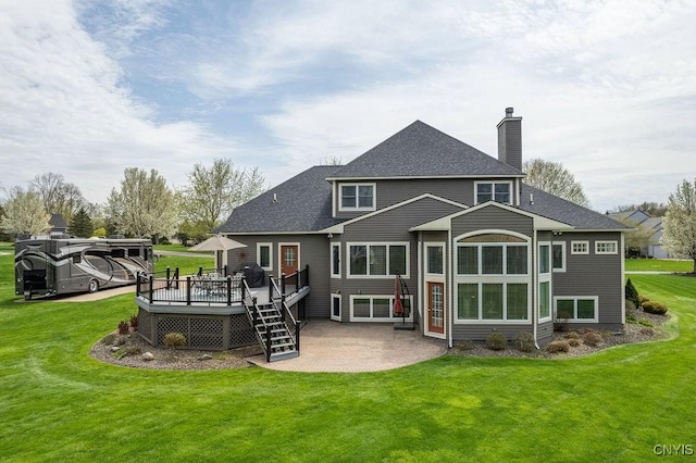 1968 Penfold Way, Lysander, NY 13027 - back of house featuring a deck, a patio, a chimney, and a yard