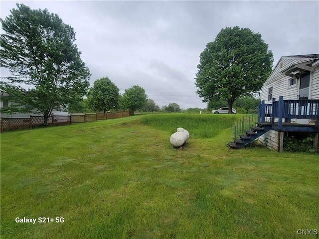 8723 E Mud Lake Rd, Lysander, NY 13027 - view of yard with a deck
