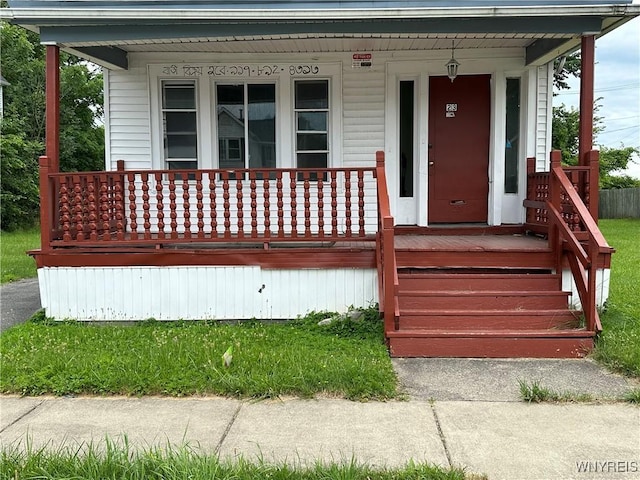 23 Cayuga St, Buffalo, NY 14211 - doorway to property featuring a porch