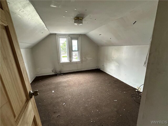 23 Cayuga St, Buffalo, NY 14211 - additional living space with lofted ceiling and baseboards