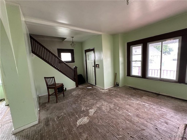 23 Cayuga St, Buffalo, NY 14211 - entryway featuring stairway and baseboards