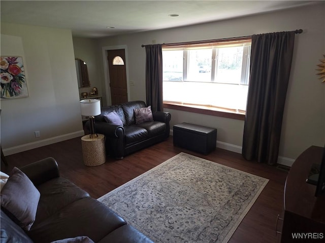 3508 Warner Dr, Grand Island, NY 14072 - living room with dark wood-style flooring and baseboards