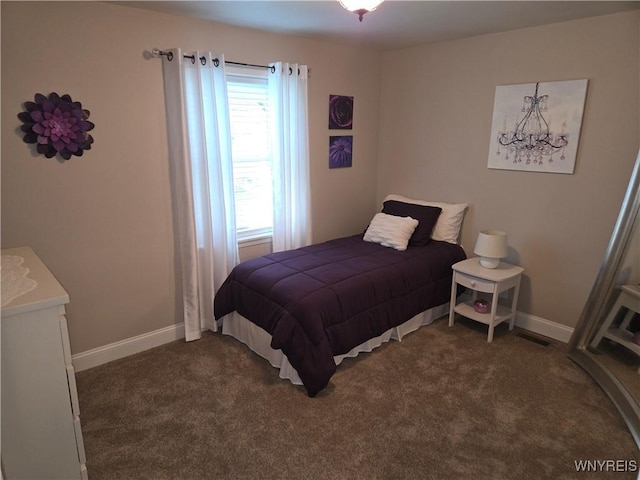 3508 Warner Dr, Grand Island, NY 14072 - bedroom featuring dark colored carpet and baseboards