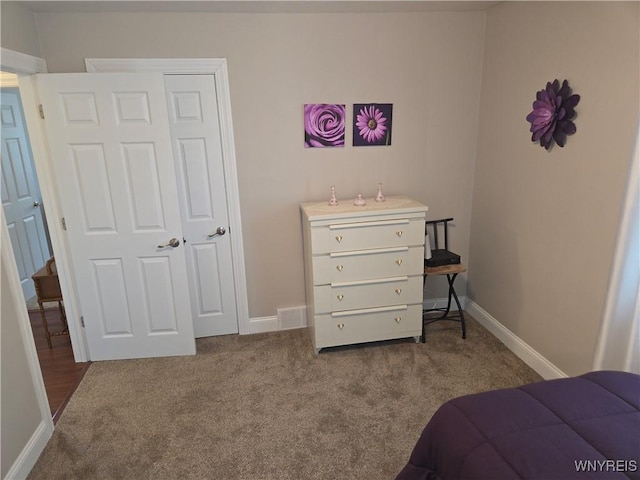3508 Warner Dr, Grand Island, NY 14072 - bedroom with dark colored carpet and baseboards