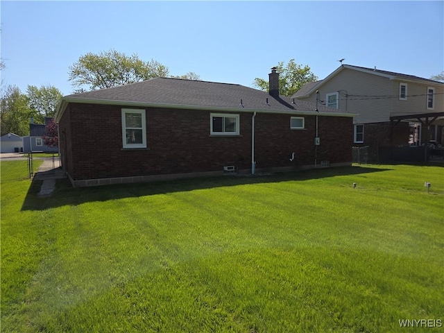 3508 Warner Dr, Grand Island, NY 14072 - back of property featuring a chimney and brick siding