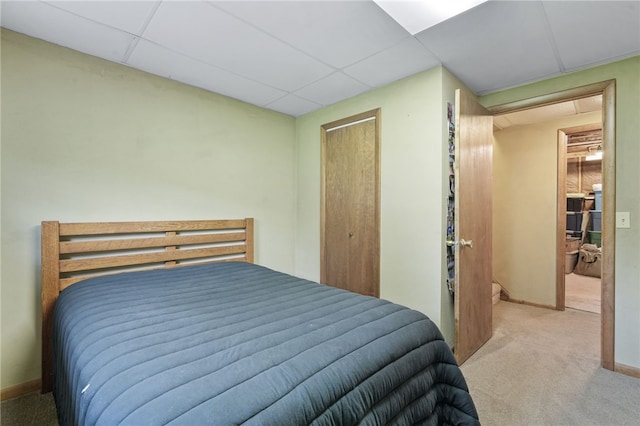 101 Winchell Rd, Owego, NY 13827 - carpeted bedroom featuring a paneled ceiling, a closet, and baseboards