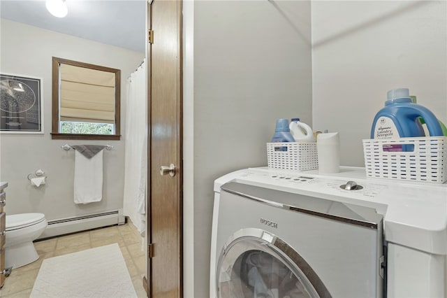 101 Winchell Rd, Owego, NY 13827 - laundry area with a baseboard radiator, washer / dryer, and light tile patterned flooring