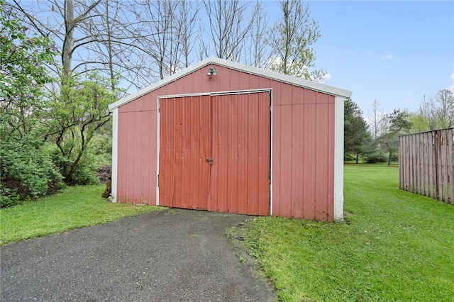 101 Winchell Rd, Owego, NY 13827 - view of pole building featuring a lawn and asphalt driveway