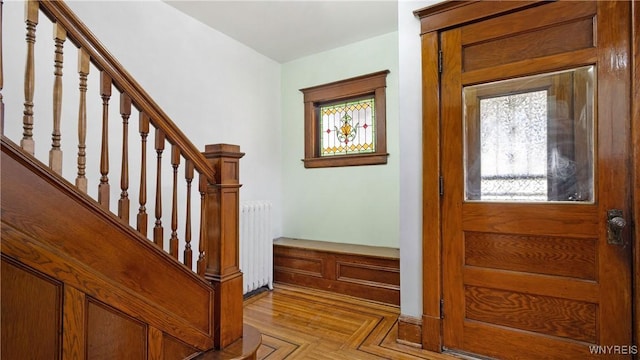54 Meech Ave, Buffalo, NY 14208 - foyer entrance featuring radiator heating unit and stairs