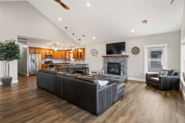 8419 Old Lake Rd, Lodi, NY 14860 - living area featuring dark wood-style floors, recessed lighting, ceiling fan, baseboards, and a fireplace
