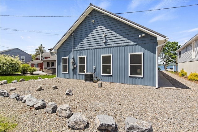 8419 Old Lake Rd, Lodi, NY 14860 - view of front of property featuring cooling unit and board and batten siding