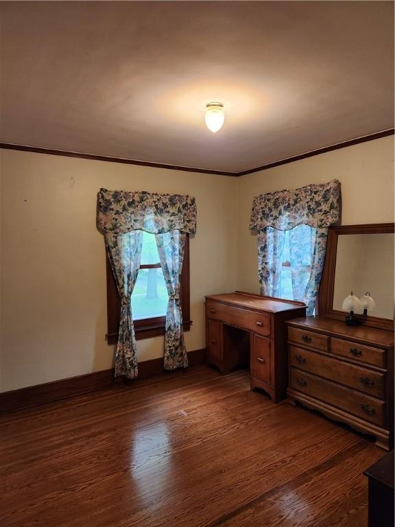 83 Vermont St, Rochester, NY 14609 - bedroom featuring dark wood finished floors and crown molding