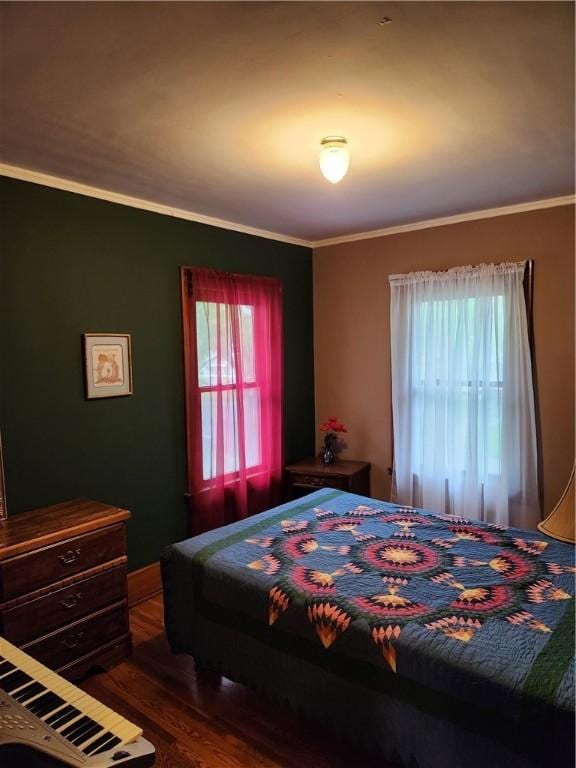 83 Vermont St, Rochester, NY 14609 - bedroom featuring wood finished floors, multiple windows, and ornamental molding