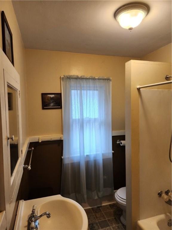 83 Vermont St, Rochester, NY 14609 - full bath featuring toilet, tub / shower combination, and a sink