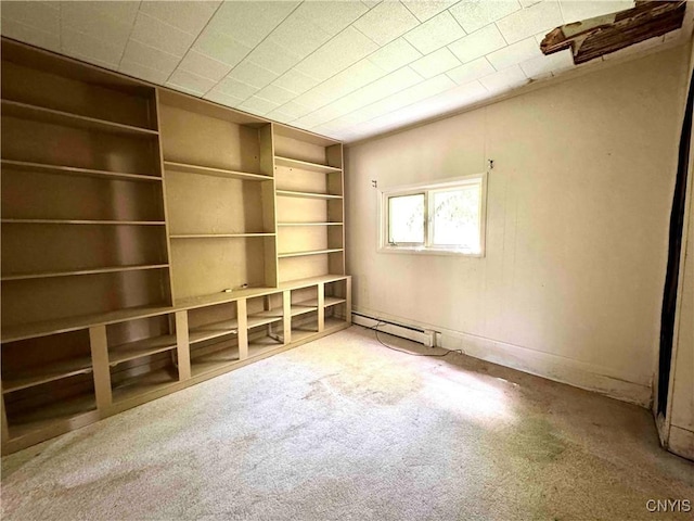 4 S St, Belfast, NY 14711 - empty room with carpet flooring and a baseboard heating unit