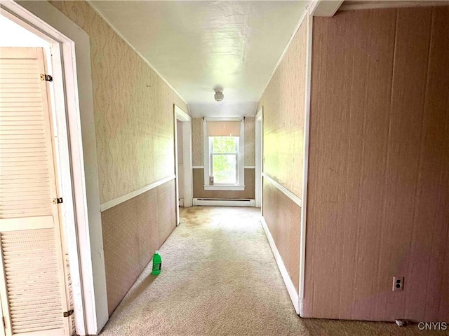 4 S St, Belfast, NY 14711 - hallway featuring wallpapered walls, a baseboard radiator, and light carpet