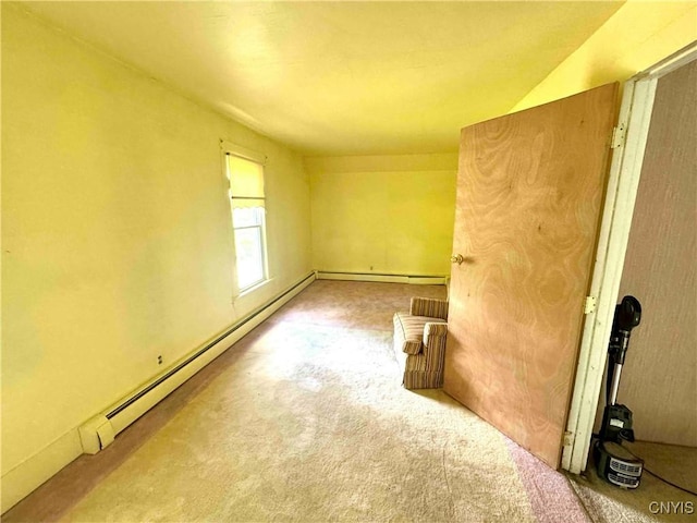 4 S St, Belfast, NY 14711 - empty room featuring a baseboard radiator, carpet floors, and baseboard heating