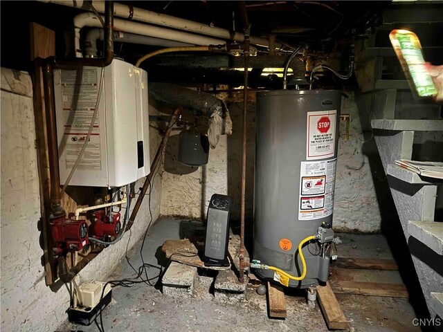 4 S St, Belfast, NY 14711 - utility room featuring gas water heater and tankless water heater