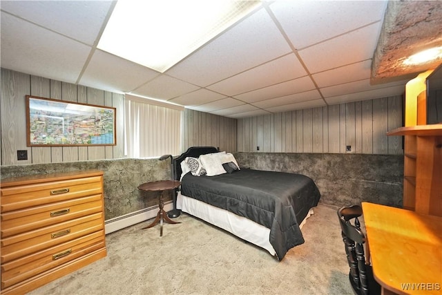 704 Beach Rd, Evans, NY 14006 - bedroom featuring a paneled ceiling, light carpet, and a baseboard radiator