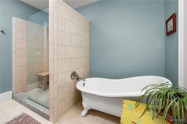 9940 Middle Rd, Pulteney, NY 14840 - full bath with a freestanding tub, a walk in shower, and tile patterned floors