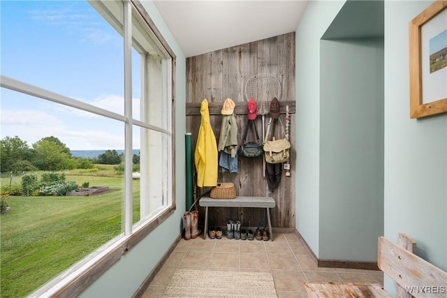9940 Middle Rd, Pulteney, NY 14840 - mudroom featuring wood walls, baseboards, and tile patterned floors