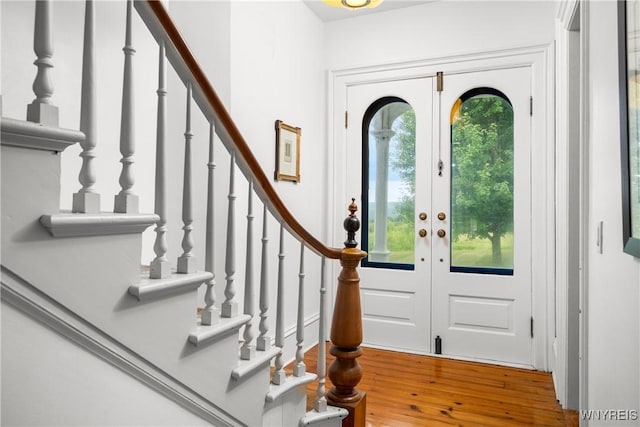 9940 Middle Rd, Pulteney, NY 14840 - entryway featuring french doors, stairs, and wood finished floors