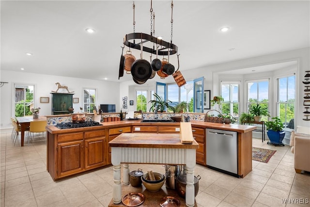 9940 Middle Rd, Pulteney, NY 14840 - kitchen with dishwasher, a kitchen island, wooden counters, black gas cooktop, and healthy amount of natural light
