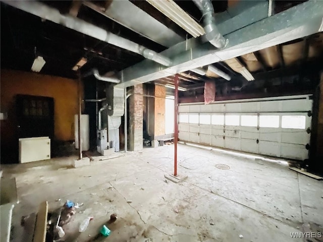 115 Stratford Rd, Buffalo, NY 14216 - garage featuring water heater and heating unit