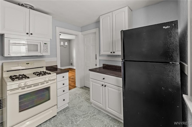 374 Victoria Blvd, Tonawanda-Town, NY 14217 - kitchen with white appliances, white cabinetry, and dark countertops