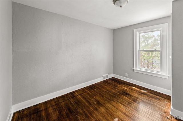 374 Victoria Blvd, Tonawanda-Town, NY 14217 - spare room featuring baseboards and dark wood-style floors