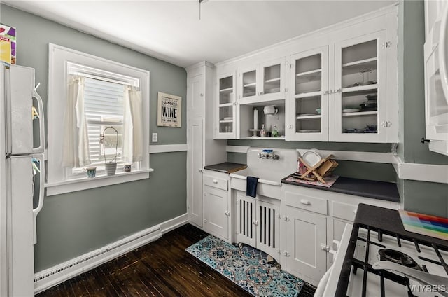 374 Victoria Blvd, Tonawanda-Town, NY 14217 - kitchen featuring freestanding refrigerator, baseboard heating, dark wood-style floors, and dark countertops