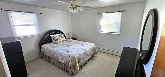 11 Donna Marie Cir, Gates, NY 14606 - bedroom featuring a baseboard radiator, light carpet, baseboards, and a ceiling fan