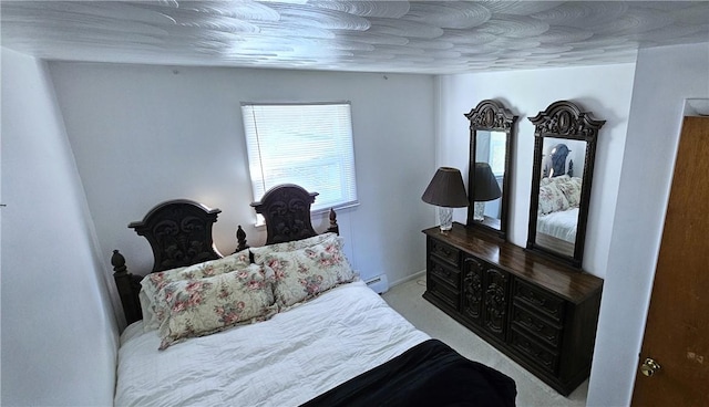 11 Donna Marie Cir, Gates, NY 14606 - bedroom featuring a baseboard heating unit and carpet