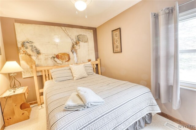 26 Pine Tree Village Rd Unit 26, Ellicottville, NY 14731 - bedroom with carpet floors and multiple windows